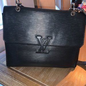 Authentic Louis Vuitton bag and matching wallet.